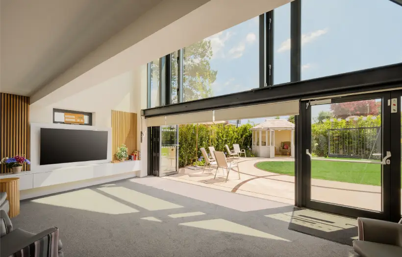 Indoor extension at Place Farm House, opening out with beautiful windows into natural light